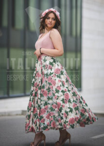 Flaunt your feminine charm with this stunning floral embroidered skirt. The delicate rose pattern paired with a soft pink top creates a graceful look perfect for any special occasion.
